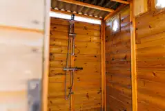 Private shower hut in the safari tent Private shower hut in the safari tent