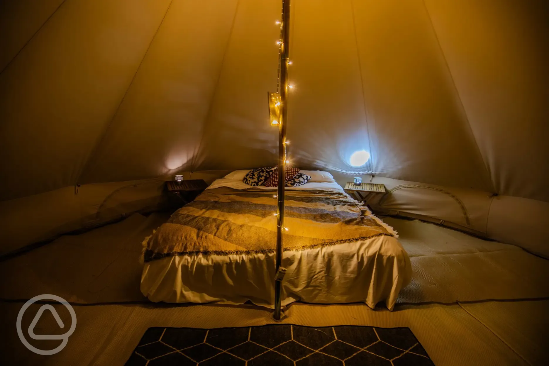 Bell tent interior at night