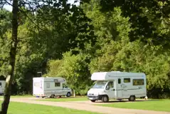 Hardstanding touring pitches (electric or fully serviced options)