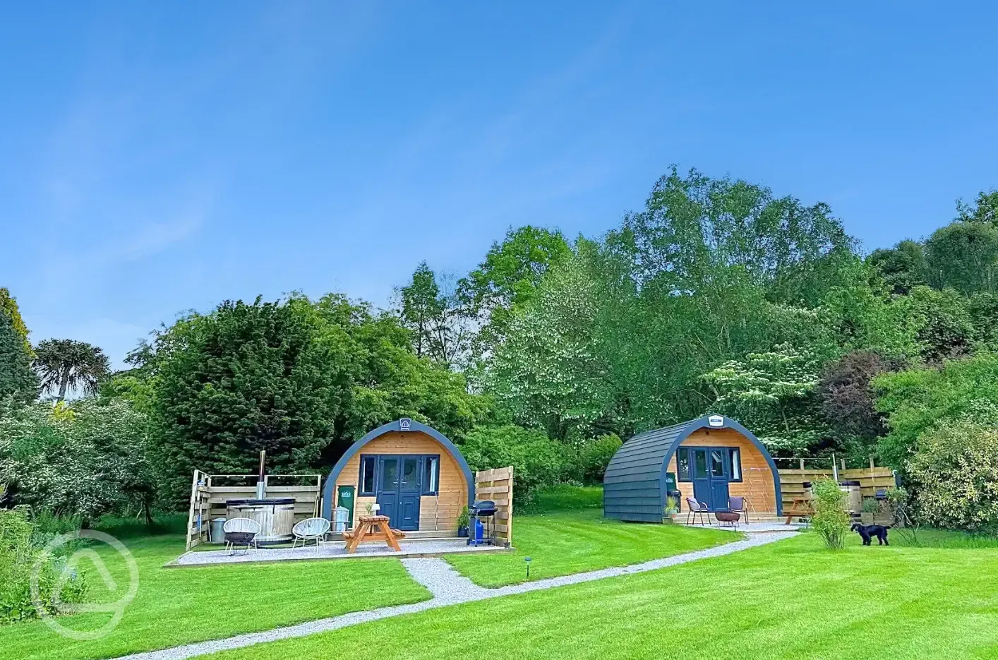 Hunts Court Huts glamping pods with wood-fired hot tubs