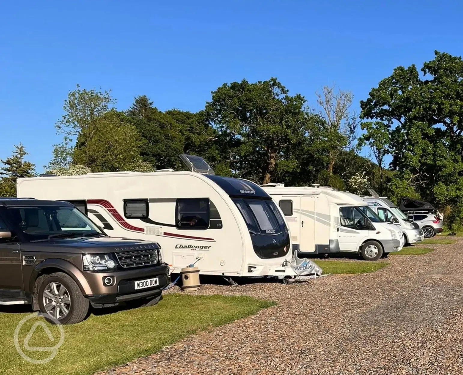 Electric grass and gravel touring pitches