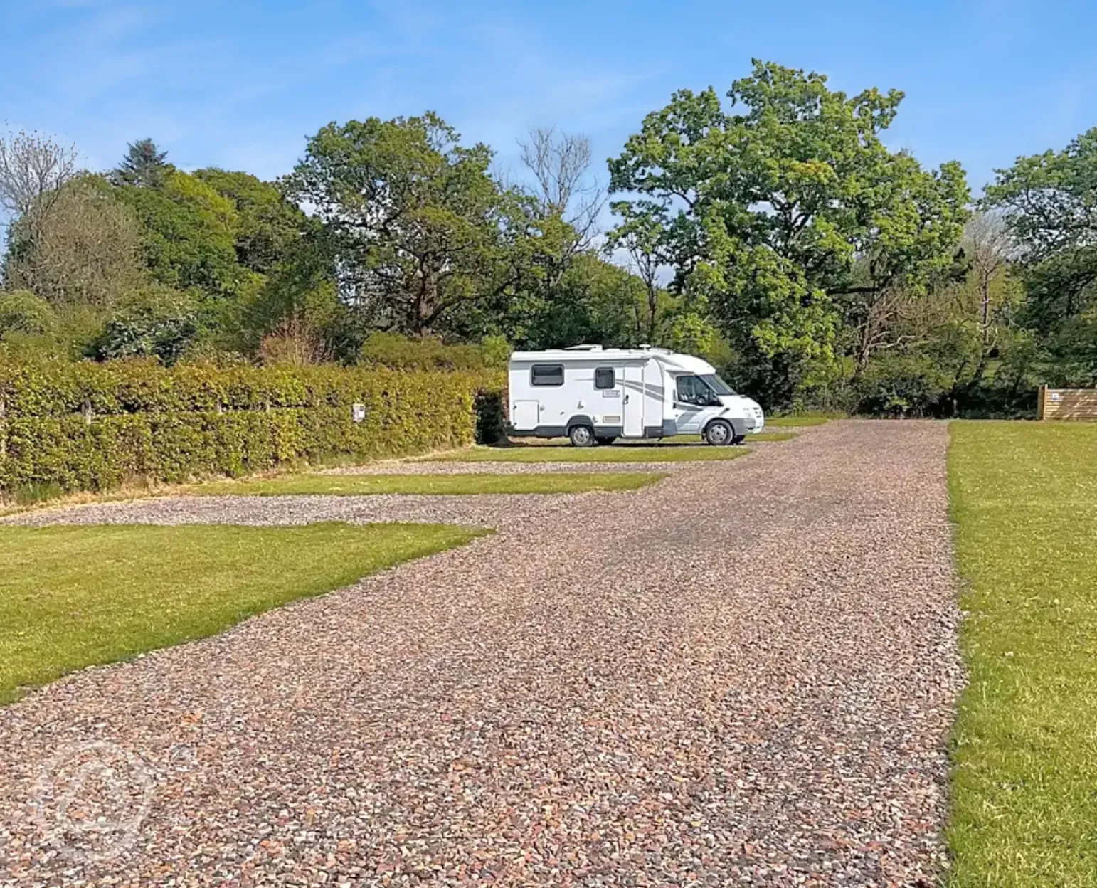 Electric grass and gravel touring pitches