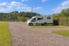 Electric grass and gravel touring pitches Electric grass and gravel touring pitches