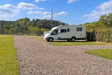 Electric grass and gravel touring pitches