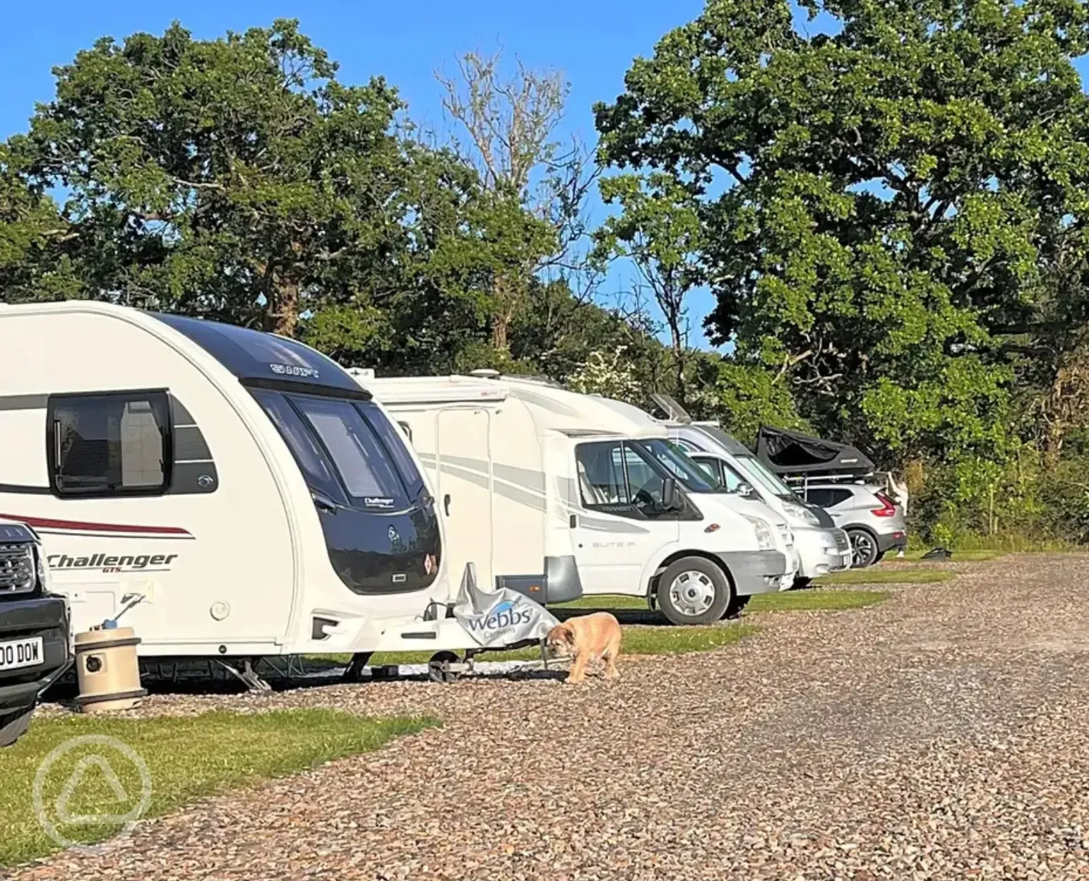 Electric grass and gravel touring pitches