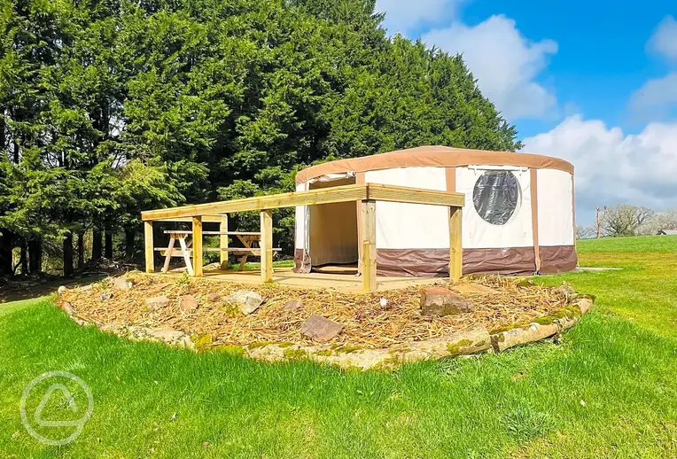 Furnished yurt with private outdoor decking space