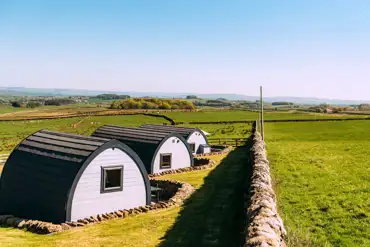 Glamping pods and countryside views