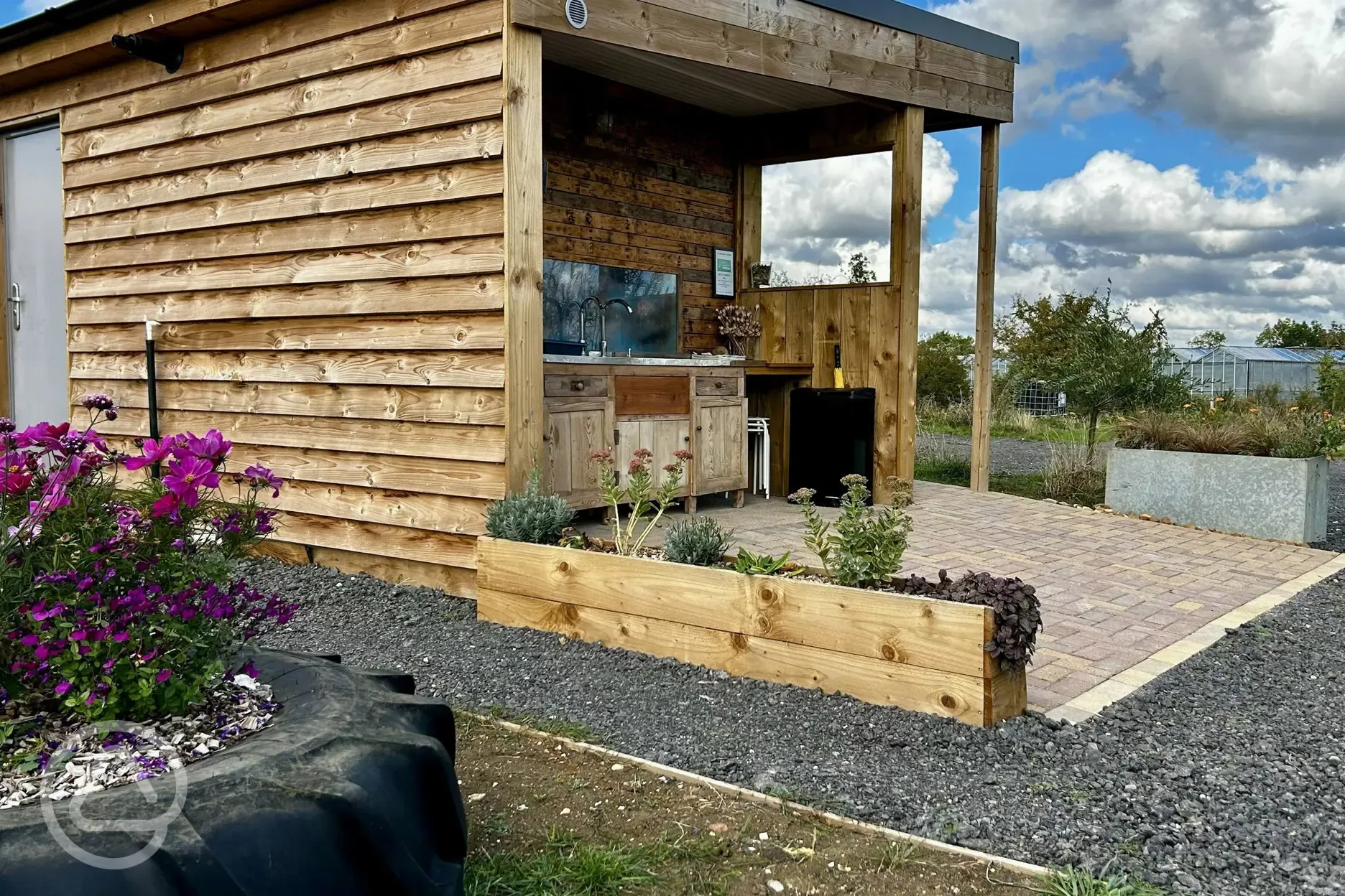 Washing up area and view back to car park at Brambles Glamping