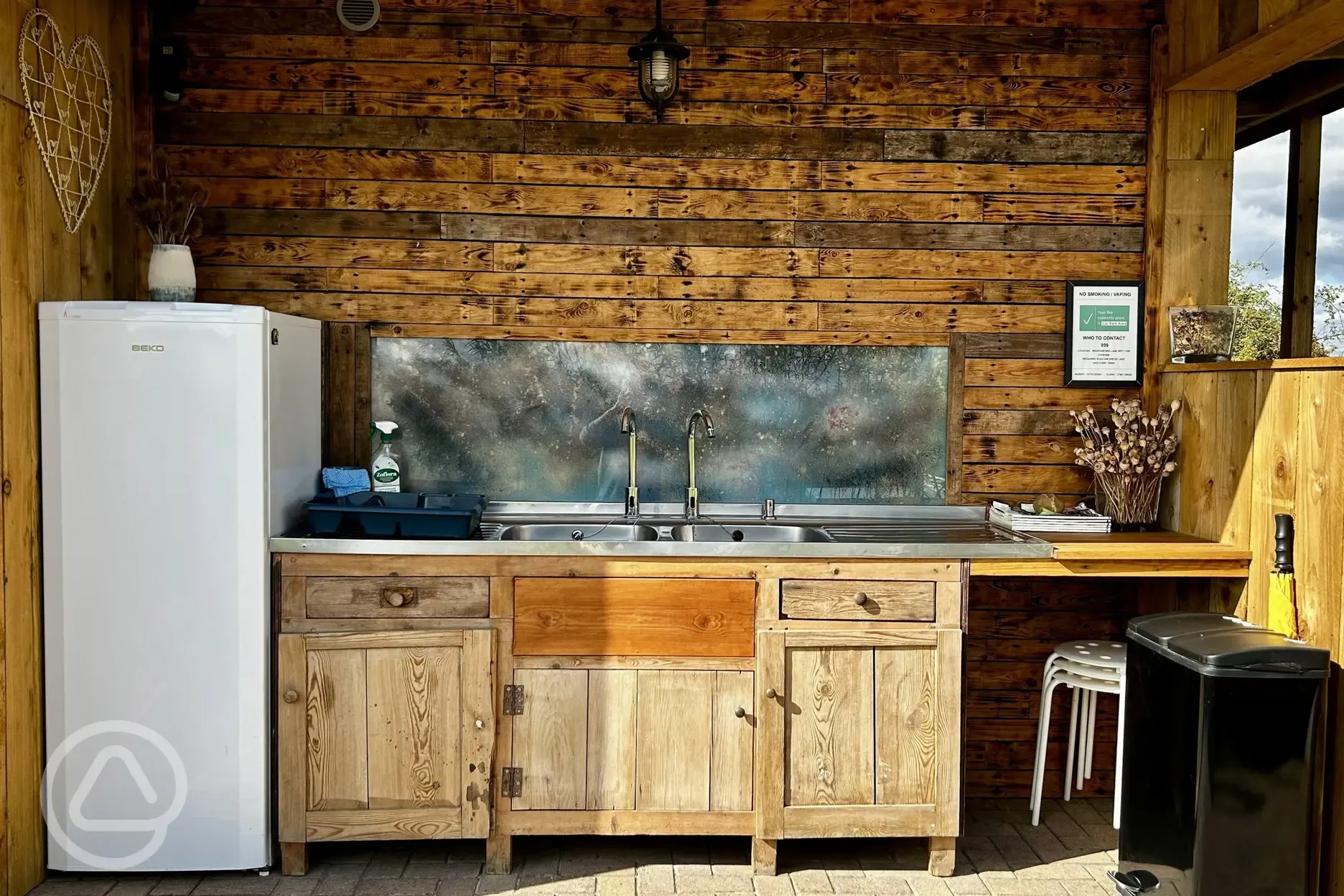 Washing up area at Brambles Glamping with communal fridge
