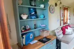 Shepherd's hut kitchen and seating area