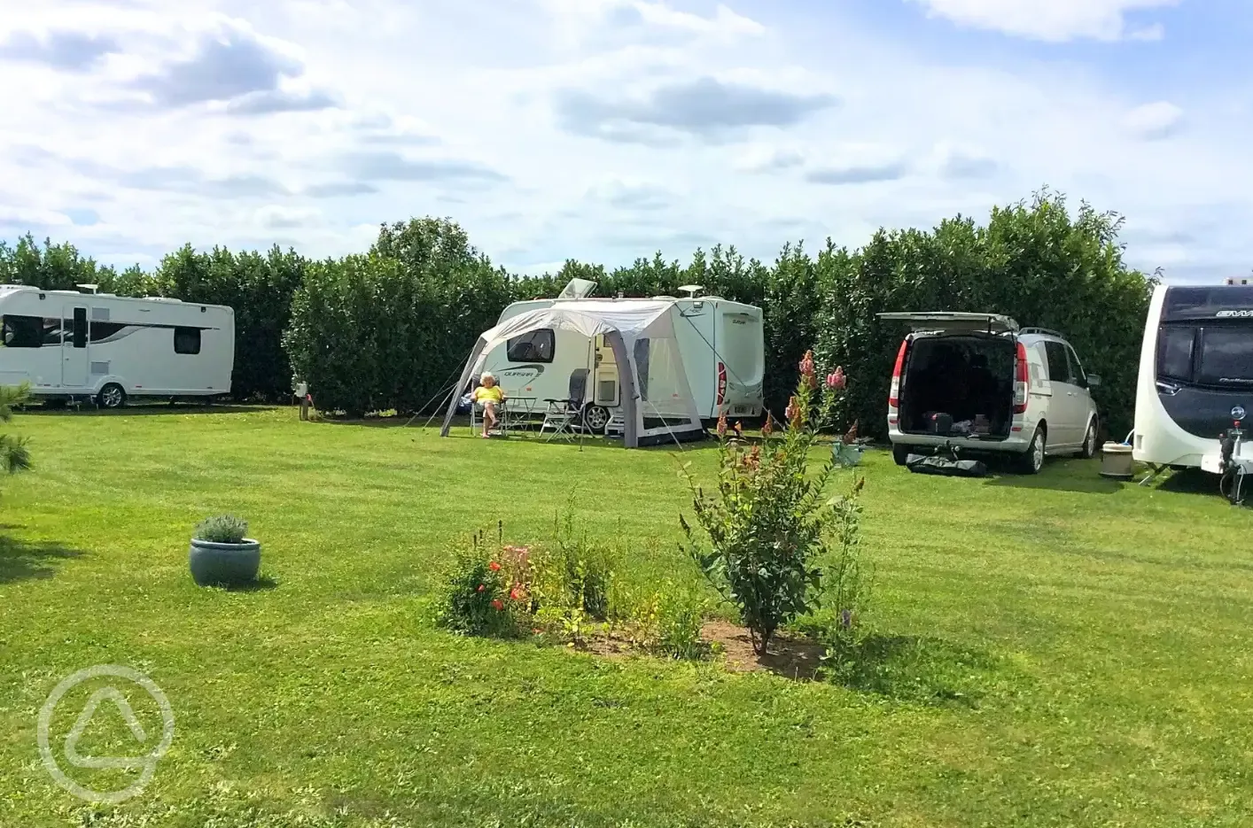 Grass and hardstanding touring pitches - optional electric
