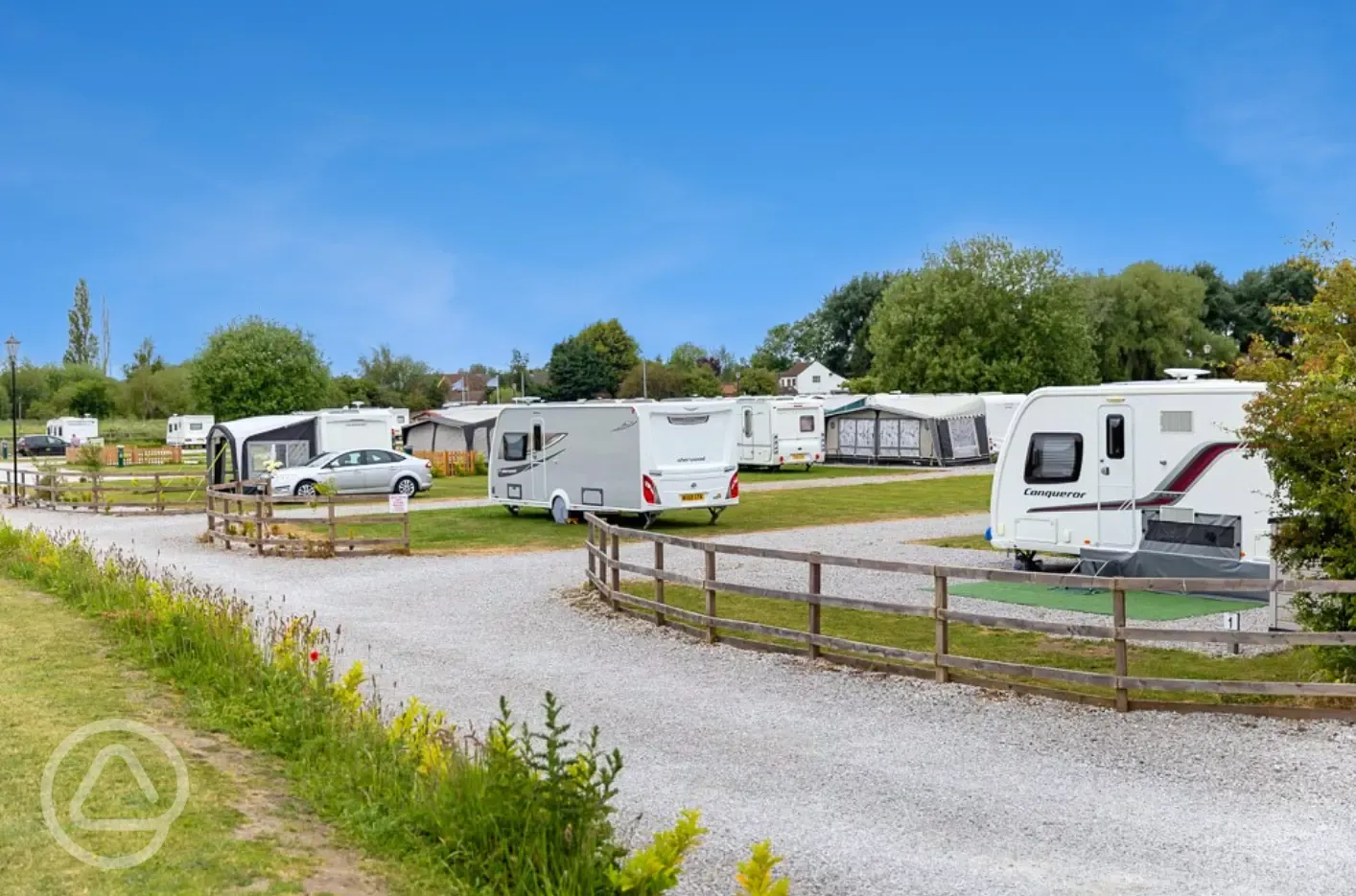 Grass and hardstanding touring pitches - optional electric