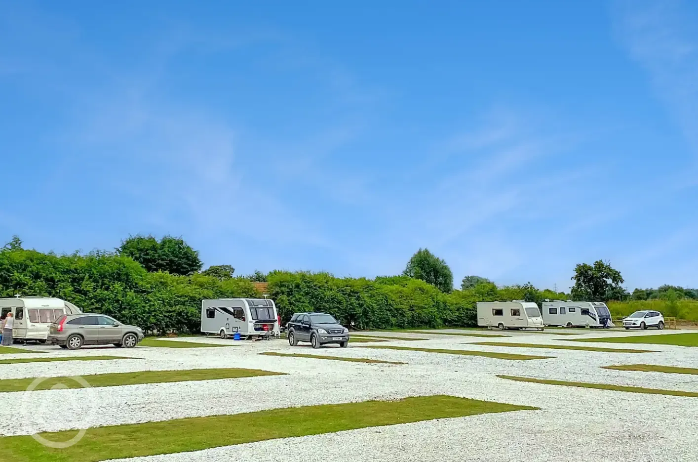 Grass and hardstanding touring pitches - optional electric