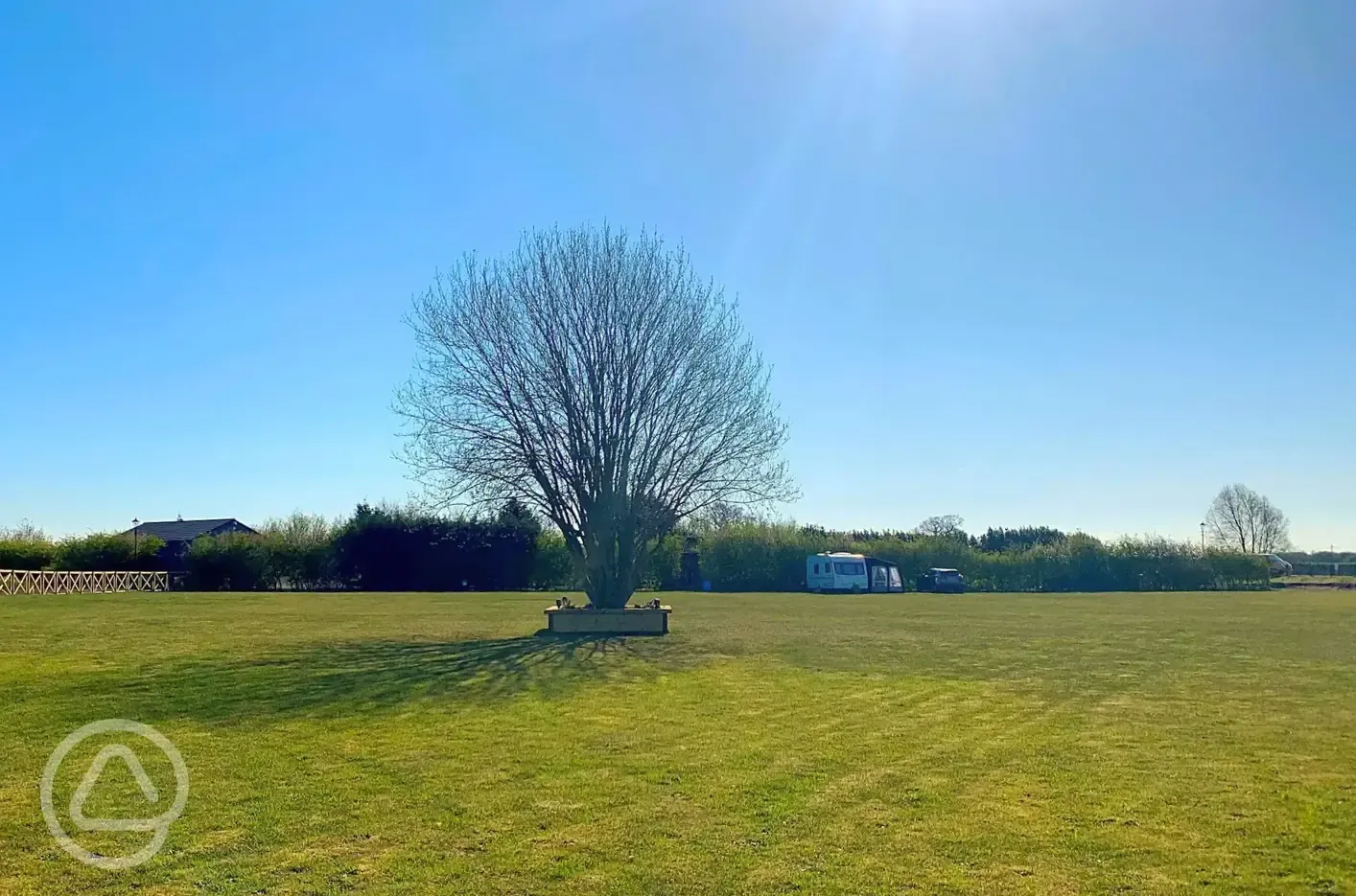 Grass and hardstanding touring pitches - optional electric