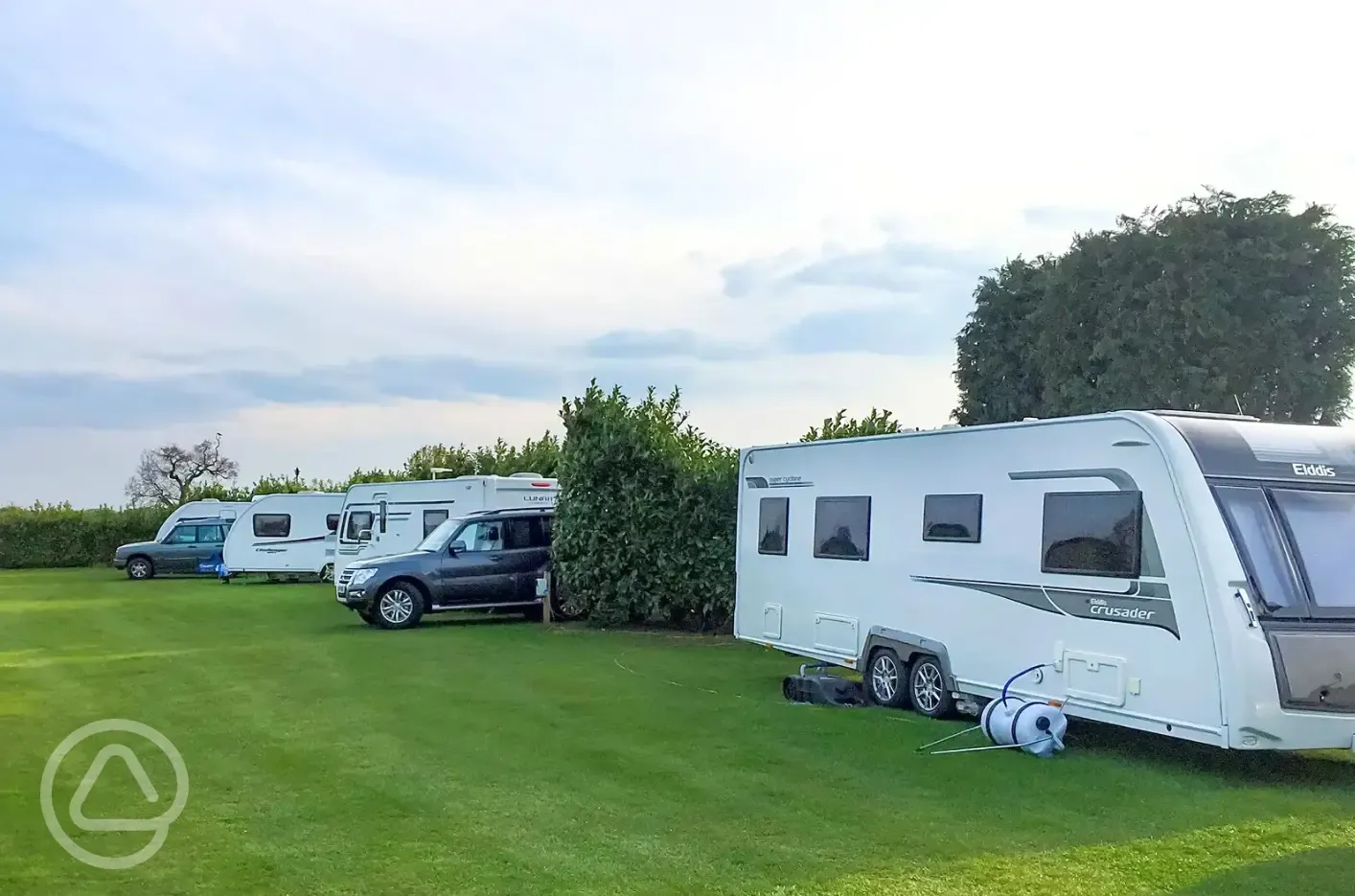 Grass and hardstanding touring pitches - optional electric