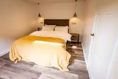 Kingsize bedroom with bedside tables (bedding included)