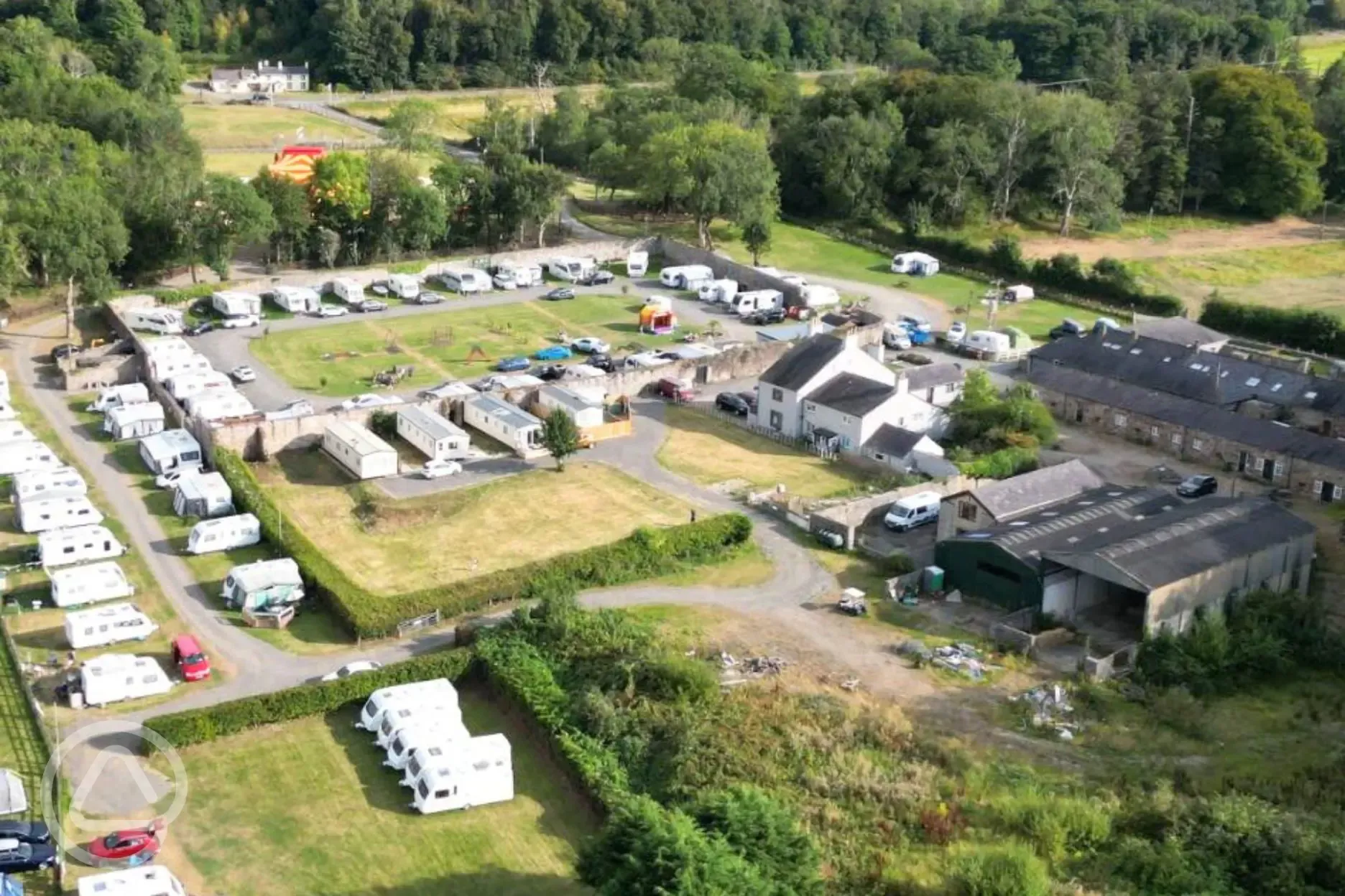 Overview of Treborth Hall Farm with Snowdonia National Park in the distance