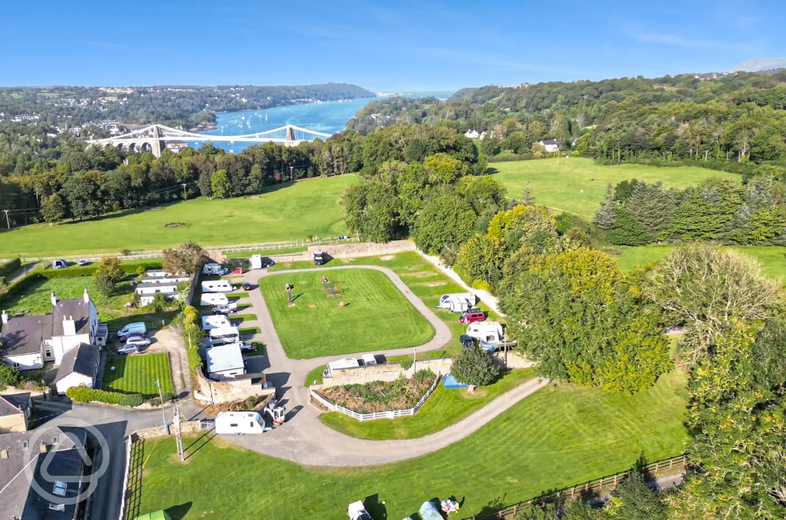 Aerial of Treborth Hall Farm Caravan Site and Menai bridge