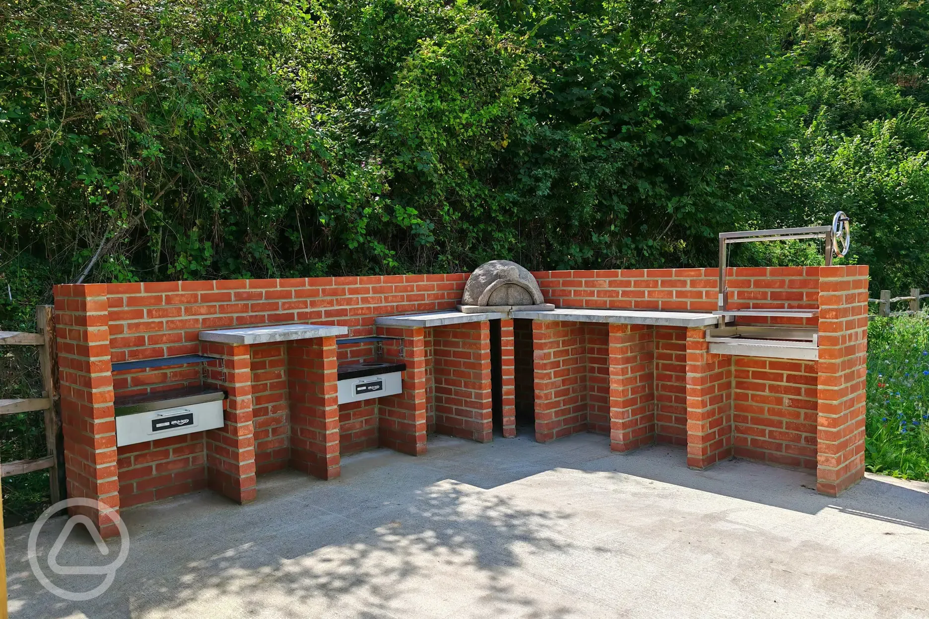 Shared BBQ and pizza oven area