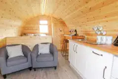Embden glamping pod kitchenette and view towards the bed area Embden glamping pod kitchenette and view towards the bed area