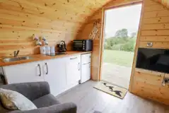 Embden glamping pod interior with a dining area and smart TV Embden glamping pod interior with a dining area and smart TV