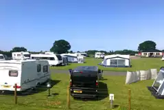 Electric grass touring pitches with 10 amp hook ups
