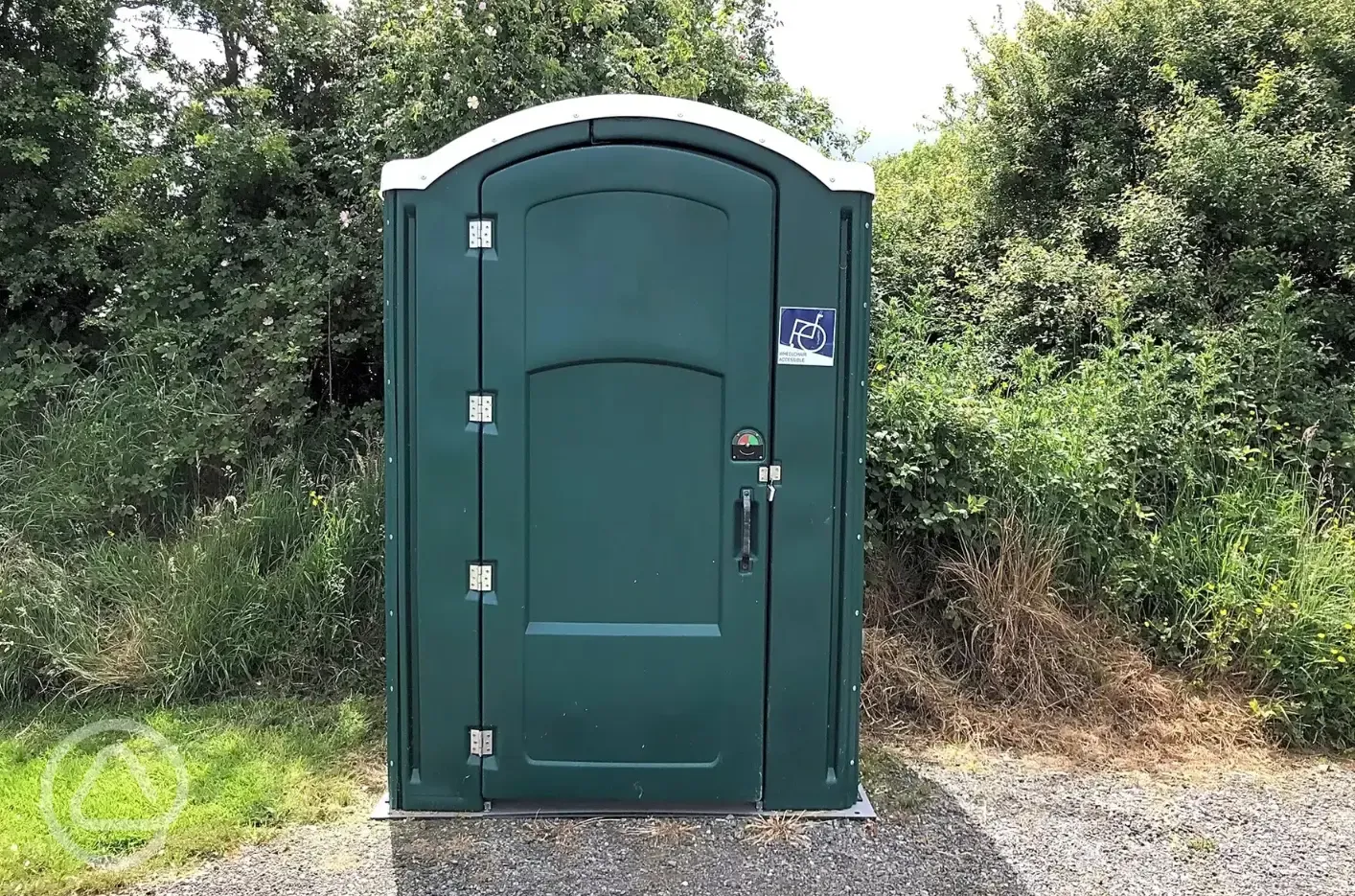 Accessible portable toilet by the fishing pools