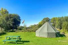 The Quirky Carp bell tent with picnic bench, fire pit and decking area
