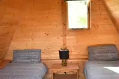 Single beds in Ed's camping pod (bedding included) Single beds in Ed's camping pod (bedding included)