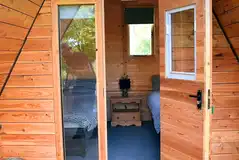 Ed's pod decking area with doors inside the pod