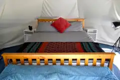 Stockies bell tent king sized bed (bedding included) Stockies bell tent king sized bed (bedding included)