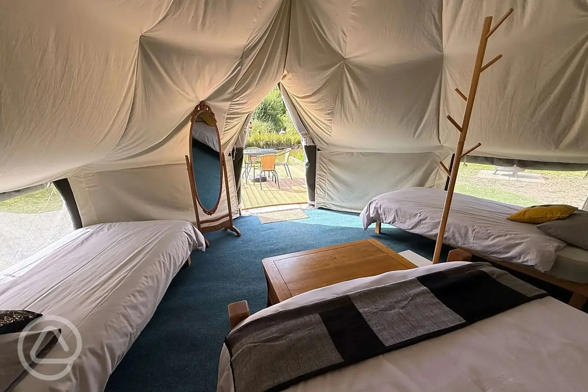 The Quirky Carp bell tent interior with king sized bed and singles