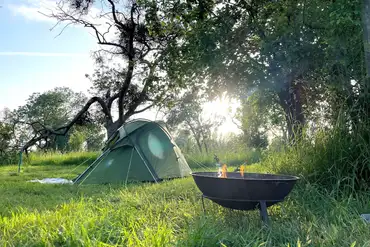 Non electric grass pitches with fire pits to borrow at Broadway Farm Camping
