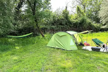 Medium sized tent on a non electric grass pitch 