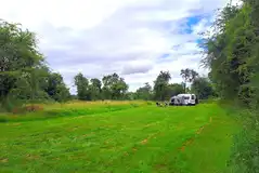 Campervan on a non electric grass at Broadway Farm Camping