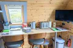Robins Nest glamping pod breakfast bar and smart TV