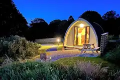 Pod lit up at night 