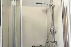 Ensuite bathroom with a shower