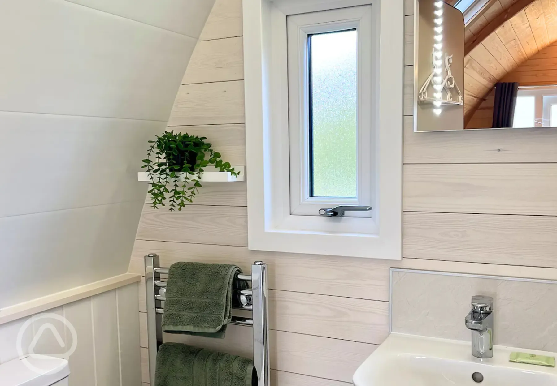 Ensuite bathroom with a heated rail and towels provided