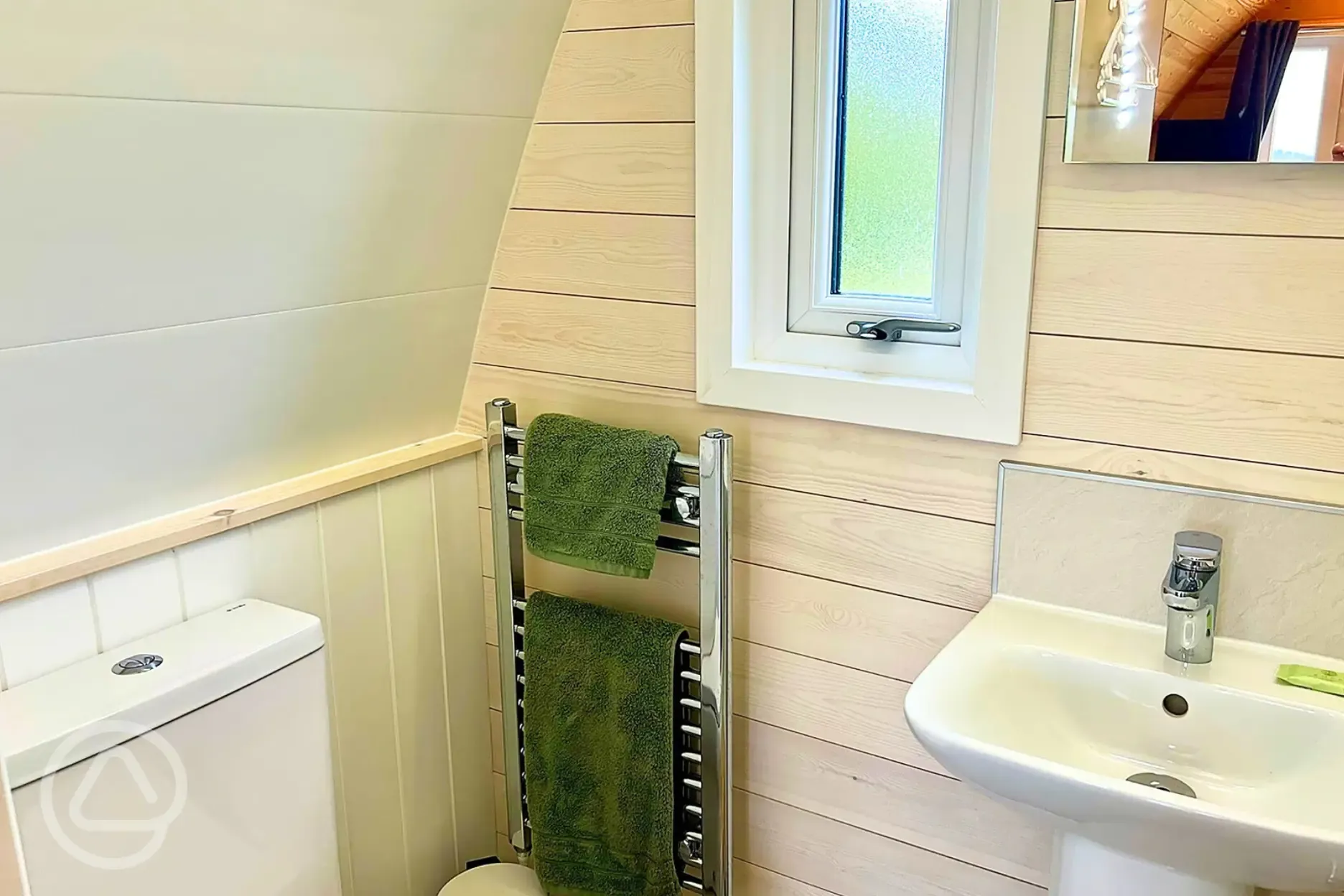 Ensuite bathroom with a heated rail and towels provided