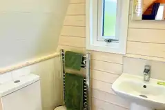 Ensuite bathroom with a heated rail and towels provided