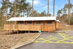 The dedicated parking and ramp access to the Accessible Deluxe Safari Tent