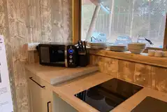 Well equpped low level kitchenette in the Accessible Deluxe Safari Tent