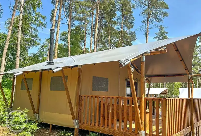 Premium Safari Tent with step access amongst the woodland