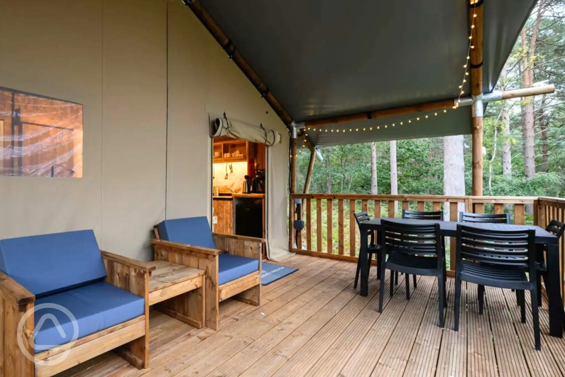 Premium Safari Tent with outdoor seating and dining area