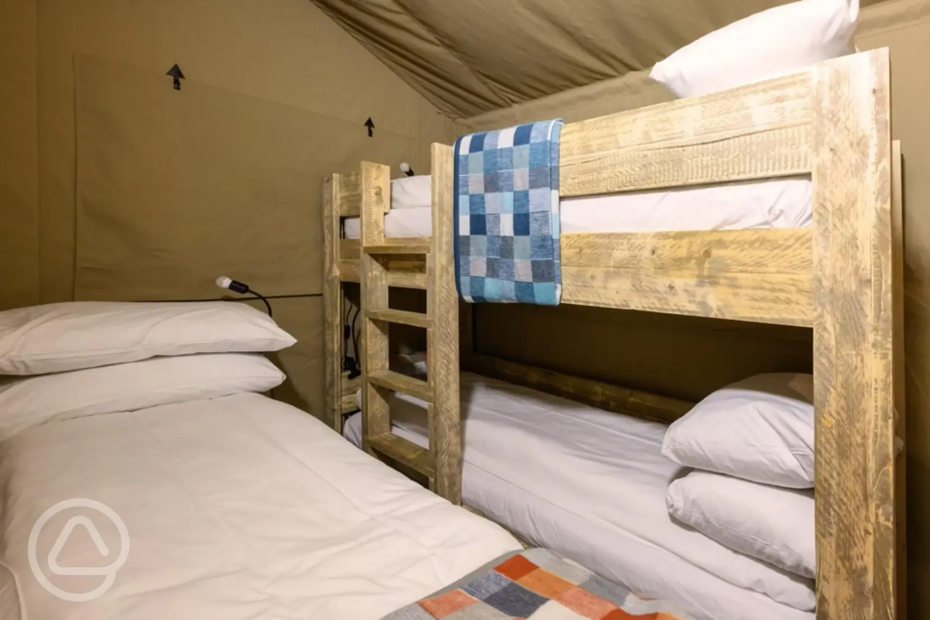 Premium Safari Tent bedroom with a bunk and single bed (bedding provided)
