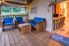 Large Deluxe Safari Tent with an outdoor sofa area