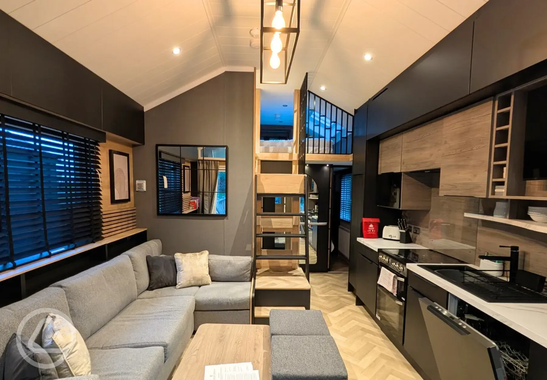 Superior glamping cabin interior with a mezzanine twin level