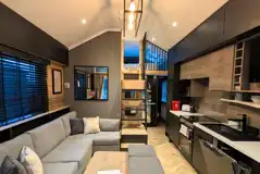 Superior glamping cabin interior with a mezzanine twin level