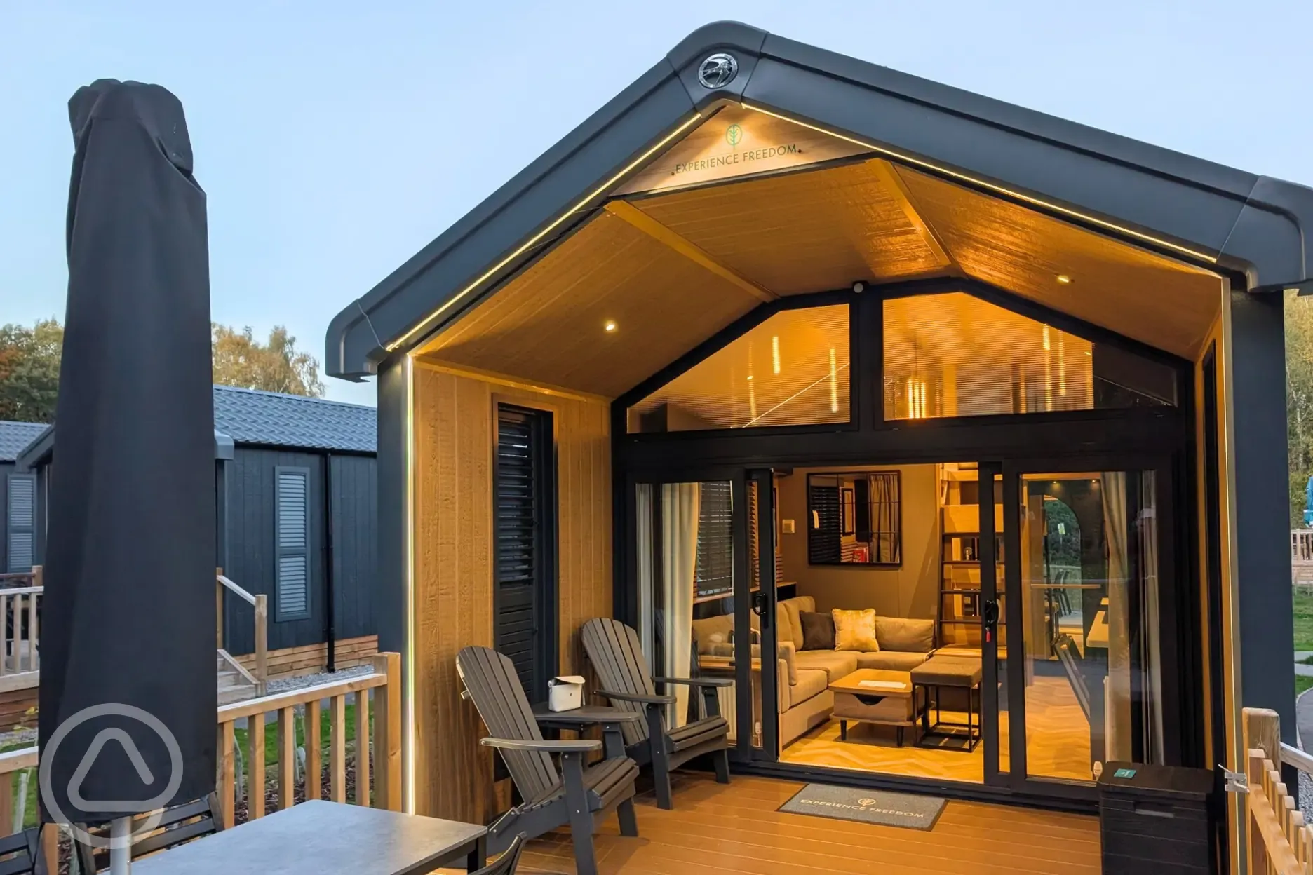 Superior glamping cabins with an outdoor decking area